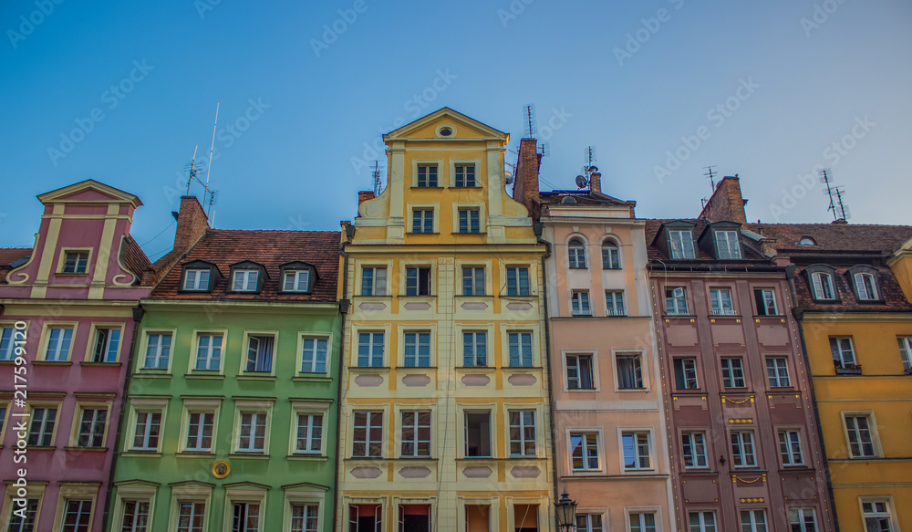 soft focus cozy small architecture concept of colorful facades buildings in contrast summer bright day time