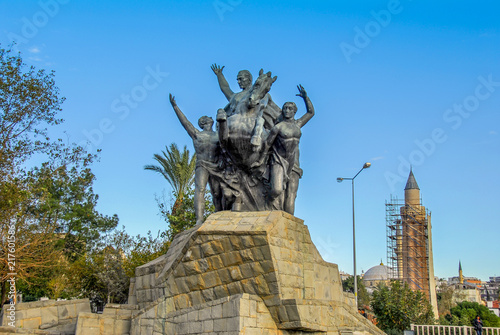 Antalya, Turkey, 18 December 2010: Clock Tower at Muratpasa with Statue of Mustafa Kemal Ataturk photo