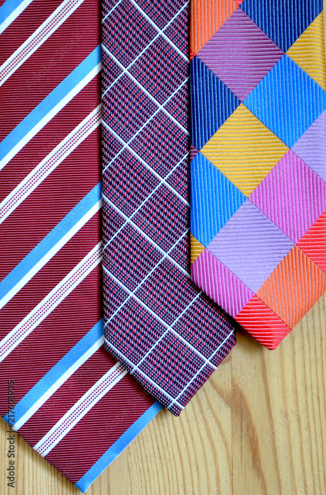 Fashion ties on the background of wooden boards. background and concept. Fashion ties on the background of wooden boards. background and concept.