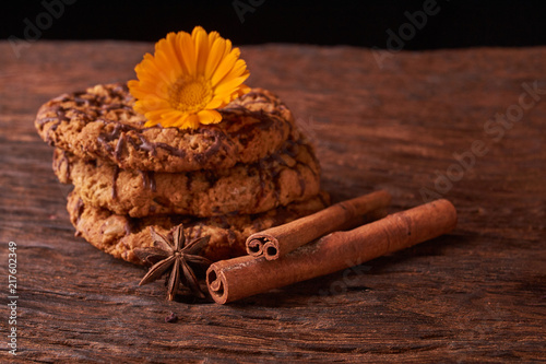 cookies and spring yellow flowers. Healthy morning breakfast concept. Minimalist. selective focus photo