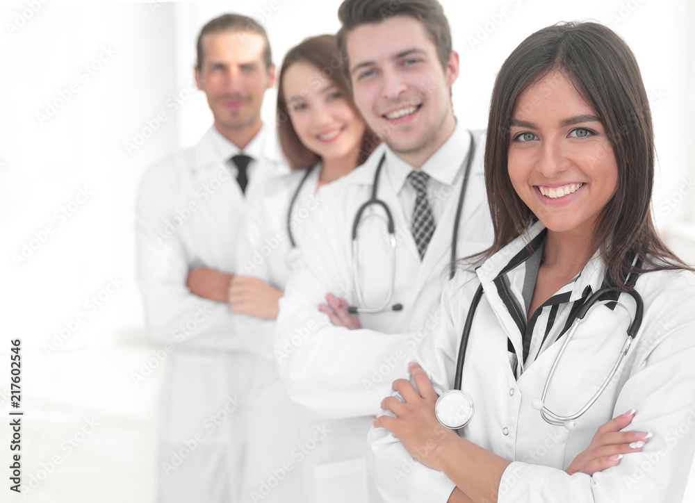 female doctor with group of happy successful colleagues female doctor with group of happy successful colleagues