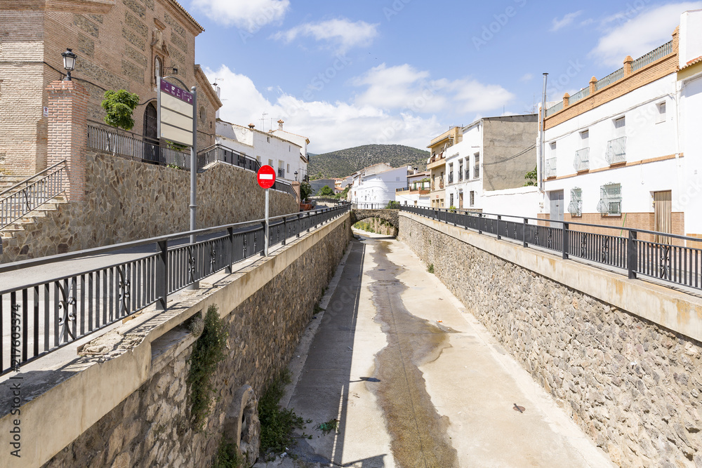 a view of Hueneja town and the Izfalada river, province of Granada, Andalusia, Spain a view of Hueneja town and the Izfalada river, province of Granada, Andalusia, Spain