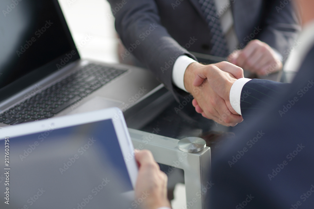 confident handshake of business partners confident handshake of business partners
