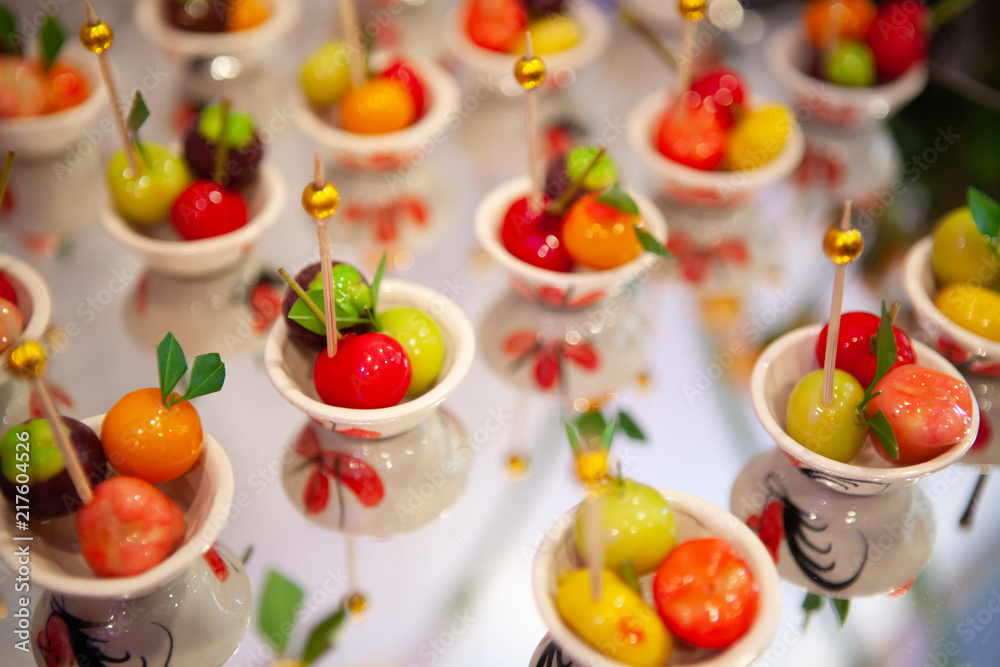 Luk Chup, Thai style mung bean Marzipan dessert shaped into miniature fruits. Concept style of Food Styling, creative plating, decorating presentation idea, arrangement for party, catering, banquet.