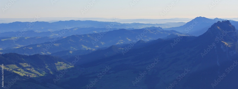 Mountain ranges in the Bernese Oberland at sunrise. View from Mount Niesen, Switzerland.