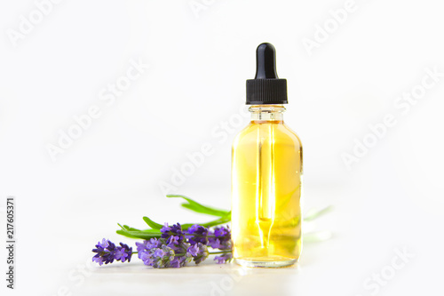 lavender essential oil in  beautiful bottle on White background