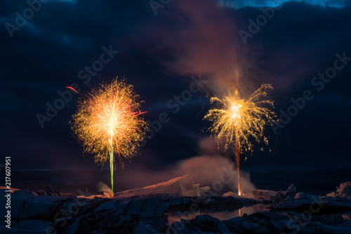 Fireworks show Jokulsarlon Glacier ice lagoon in south Iceland