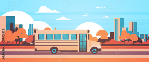 yellow bus back to school pupils transport concept on autumn cityscape background flat banner vector illustration