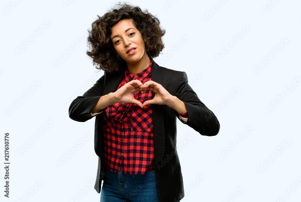 Beautiful arab woman happy showing love with hands in heart shape expressing healthy and marriage symbol Beautiful arab woman happy showing love with hands in heart shape expressing healthy and marriage symbol