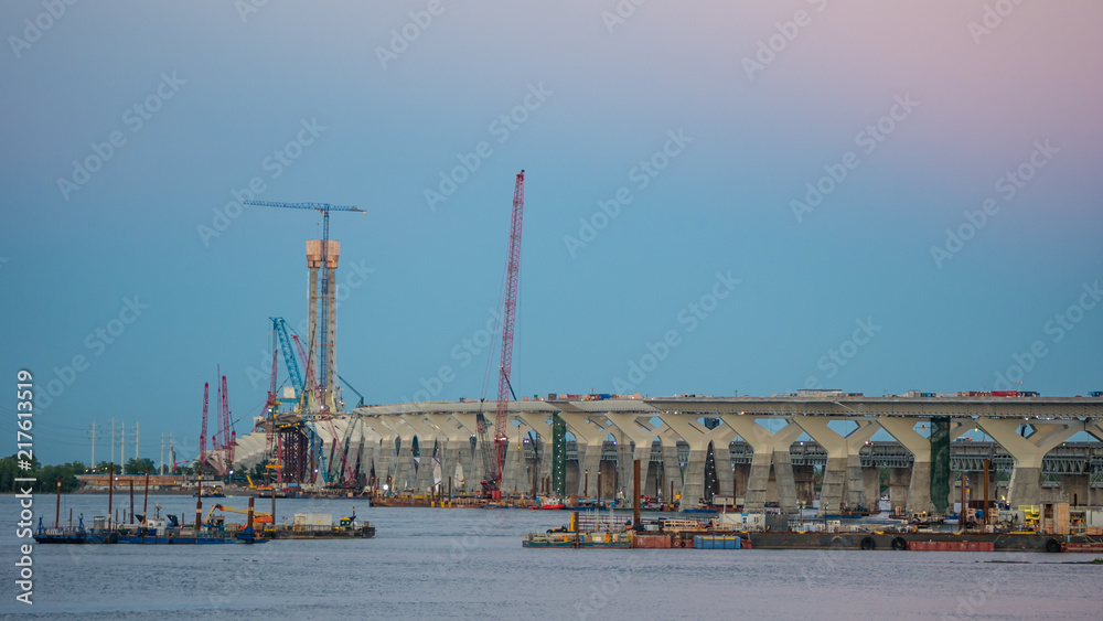 Major bridge construction site at the golden hour, Montreal, quebec, Canada. Major bridge construction site at the golden hour, Montreal, quebec, Canada.