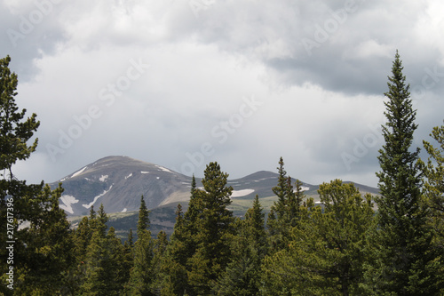 Cloudy sky and mountains wi...