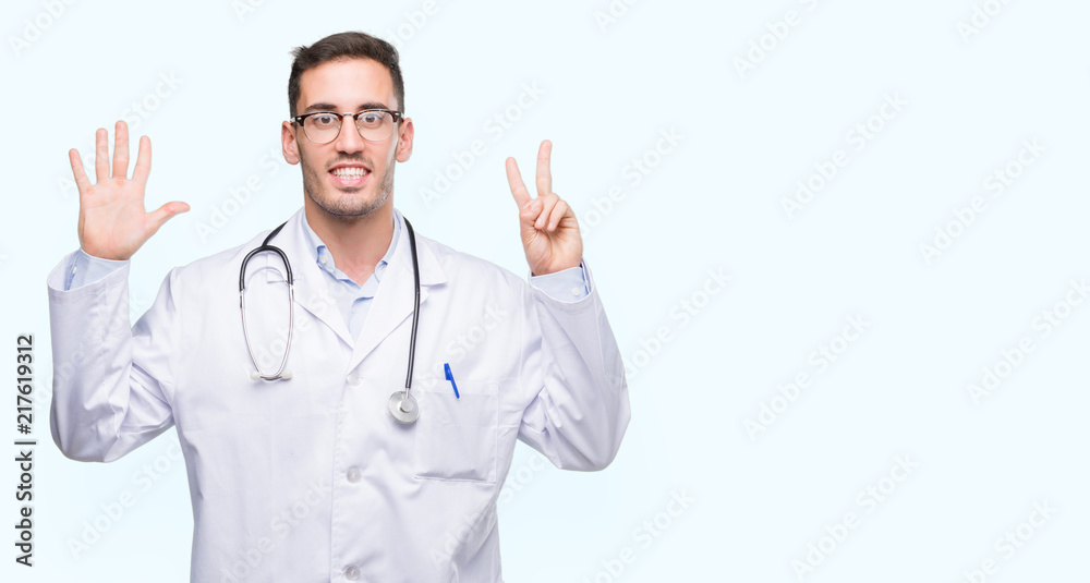 Handsome young doctor man showing and pointing up with fingers number seven while smiling confident and happy. Handsome young doctor man showing and pointing up with fingers number seven while smiling confident and happy.