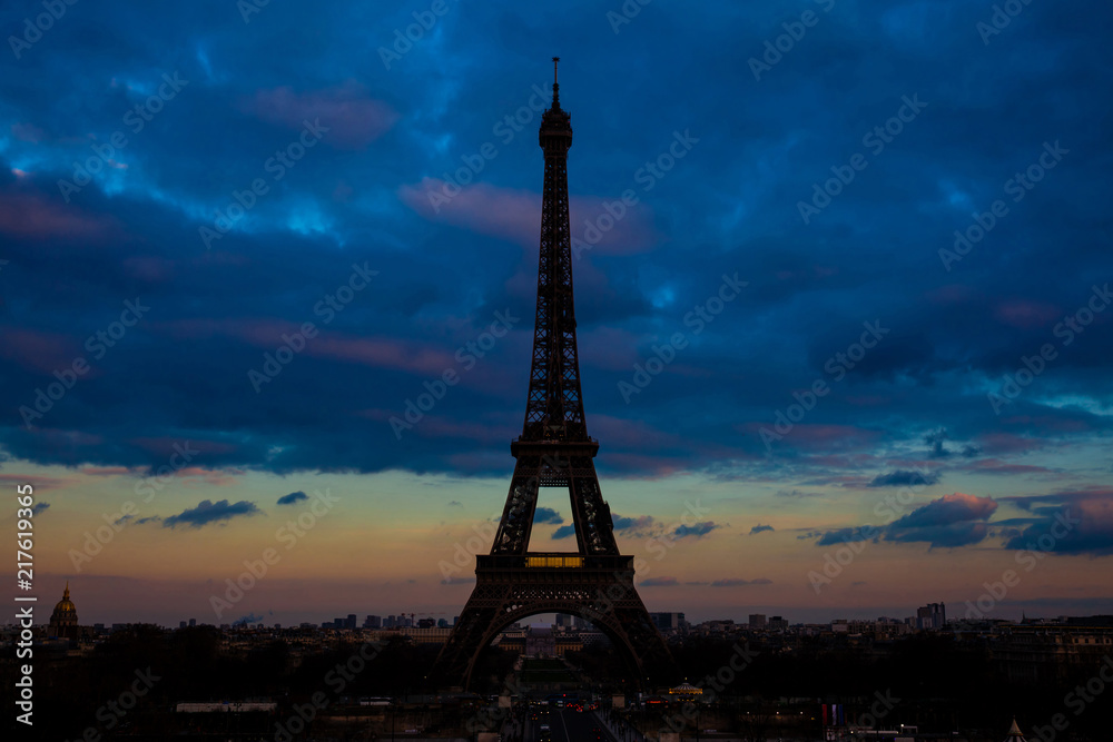 Tour Eiffel the most  famous Parisian icon at sunsent seen from Trocadero in a freezing winter day just before spring