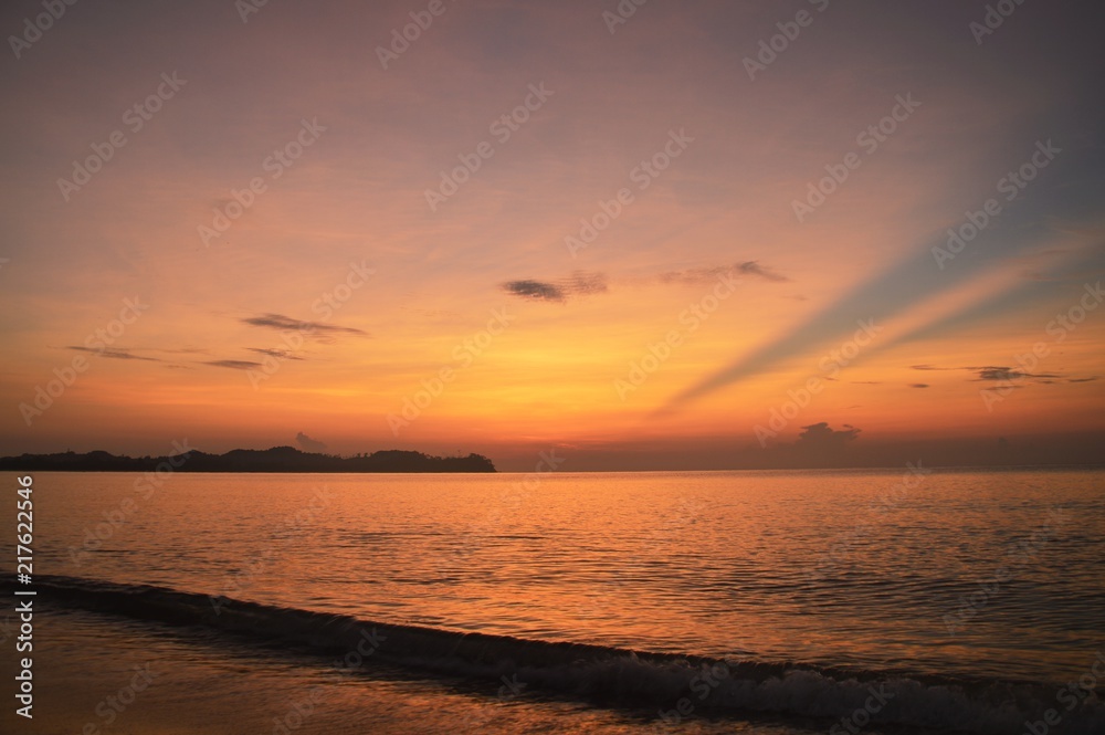 the ray of sunrise moment at Cherating beach, Malaysia