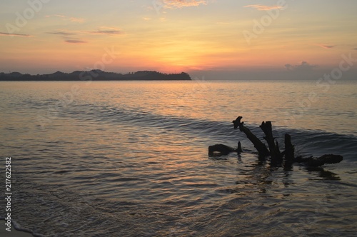 Fototapeta Naklejka Na Ścianę i Meble -  the ray of sunrise moment at Cherating beach, Malaysia