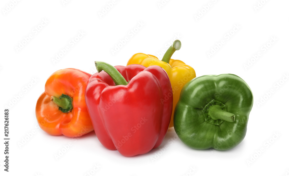 Raw ripe paprika peppers on white background Raw ripe paprika peppers on white background