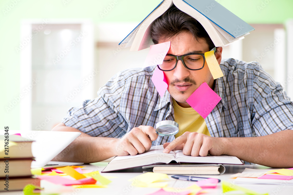 Student preparing for university exams with many conflicting pri Student preparing for university exams with many conflicting pri
