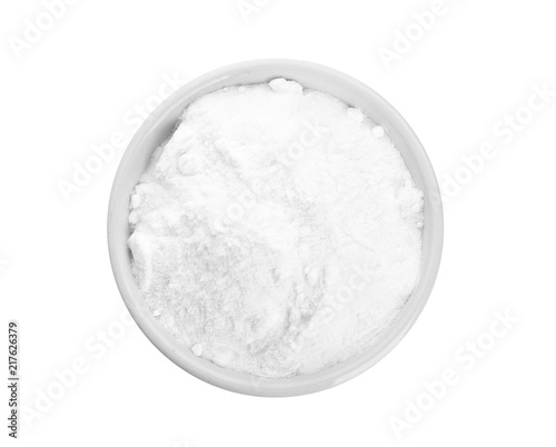 Bowl with baking soda on white background, top view