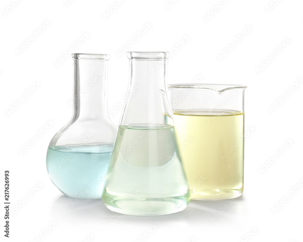 Laboratory glassware with liquid on white background. Chemical analysis Laboratory glassware with liquid on white background. Chemical analysis