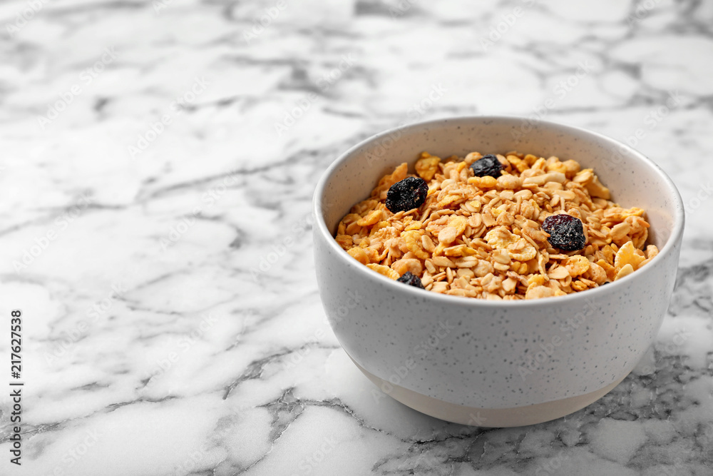 Bowl with whole grain cereal on marble table Bowl with whole grain cereal on marble table