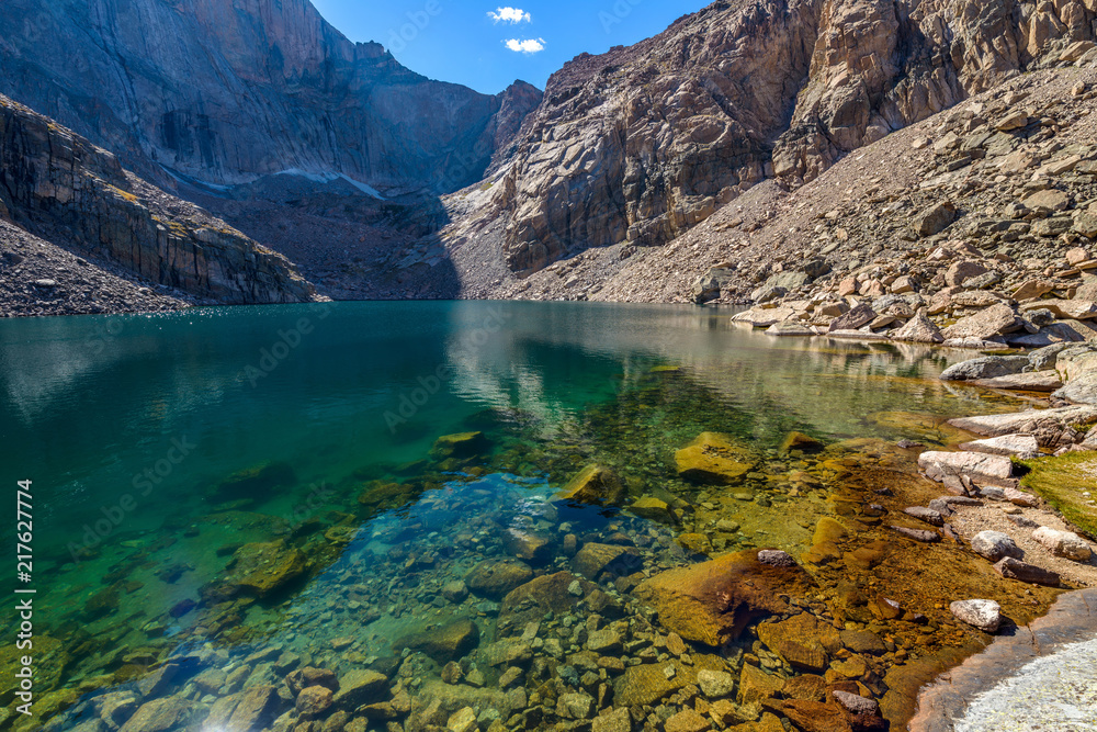 Summer Alpine Lake - Clear and colorful Chasm Lake surrounded by steep mountain ridges, Rocky Mountain National Park, Colorado, USA.  