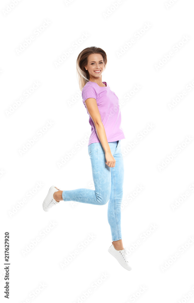 Beautiful woman jumping on white background Beautiful woman jumping on white background