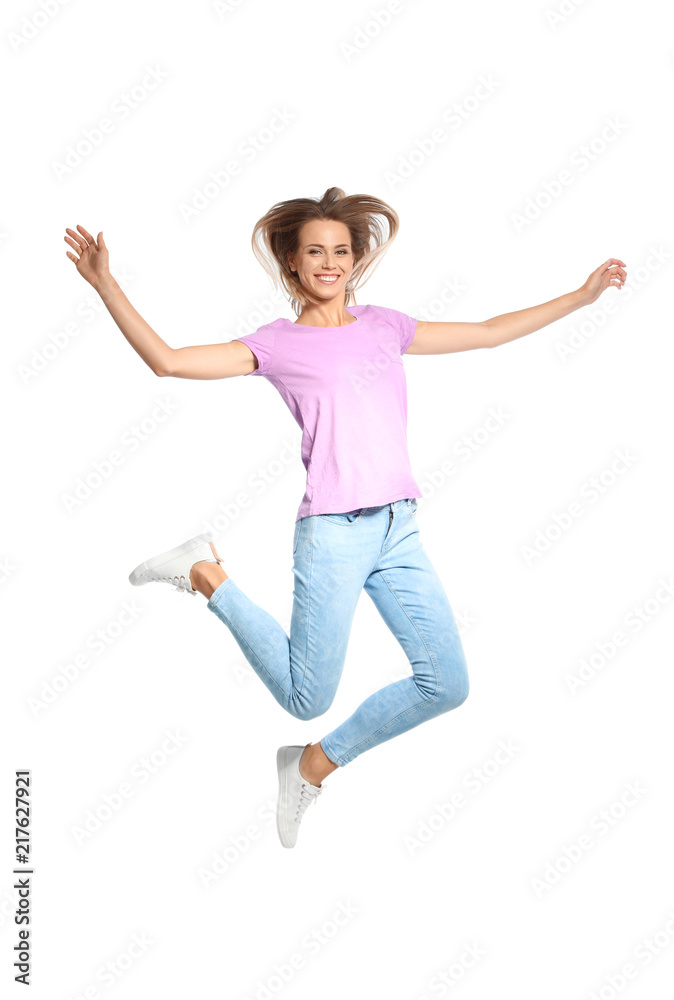 Beautiful woman jumping on white background