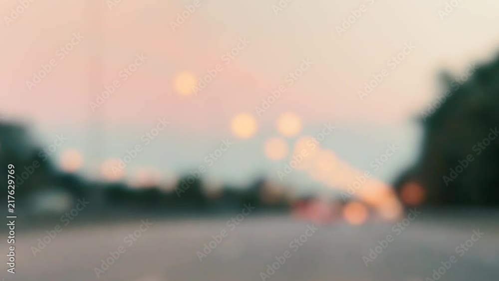 Driving car after sunset on highway, beautiful colors, blur bokeh background in 1080p Driving car after sunset on highway, beautiful colors, blur bokeh background in 1080p