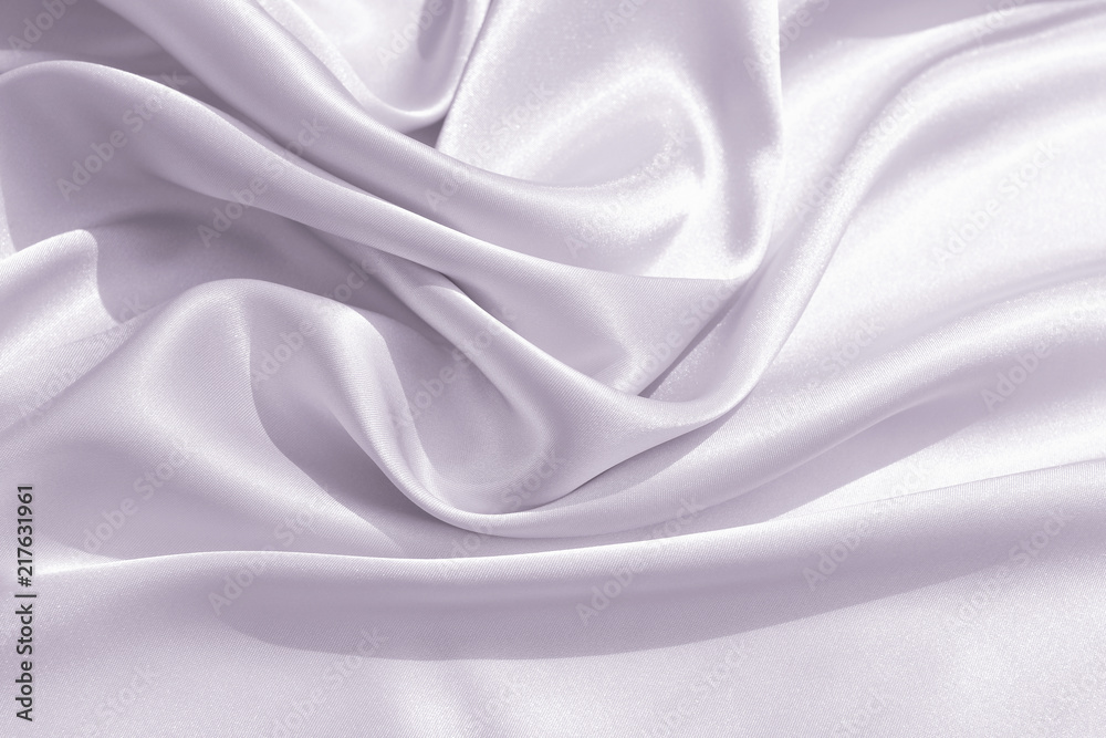 The texture of the satin fabric of lilac color for the background The texture of the satin fabric of lilac color for the background
