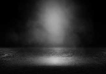 Background of an empty dark room. Empty walls, lights, smoke, glow, rays