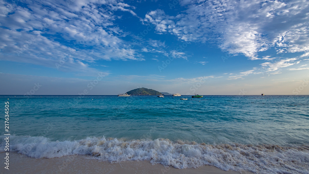 Fototapeta premium Turquoise Sea Island Blue Sky Background