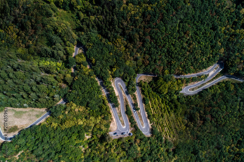 Winding road serpentine from a high mountain pass in the mosel village Brodenbach Germany Aerial view photo