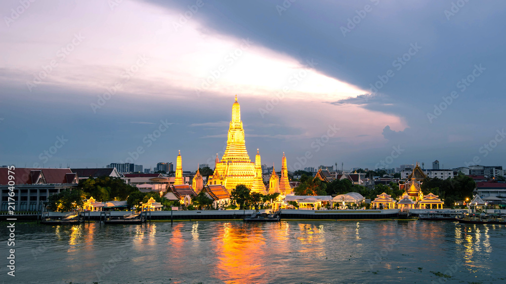 beautiful sunset wat arun temple chao phraya river, landscape Bangkok Thailand
