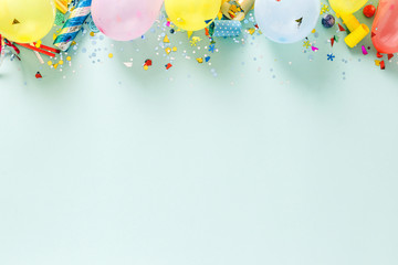 Flat lay decoration party concept pastel blue border top view