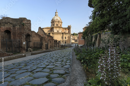 Rome, Italy - June 11, 2018: Sunset over the Church of the Saints Luca e Martina close to the Roman Fora