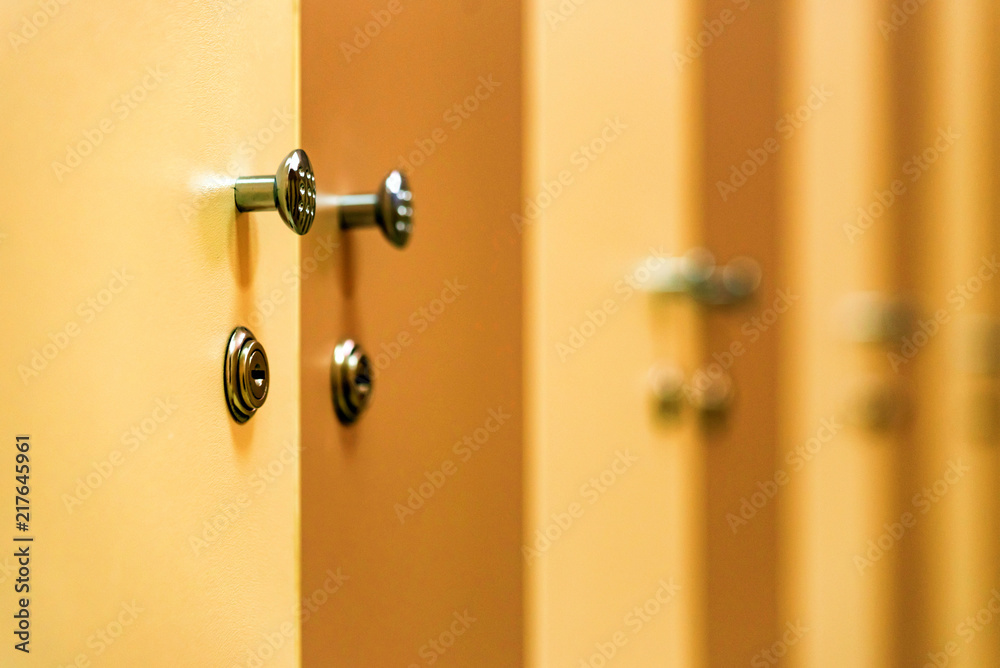 Obraz premium Wooden doors in sports gym locker room
