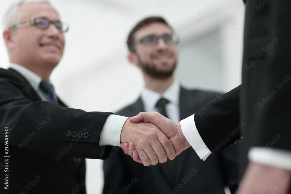 closeup handshake proven business partners closeup handshake proven business partners