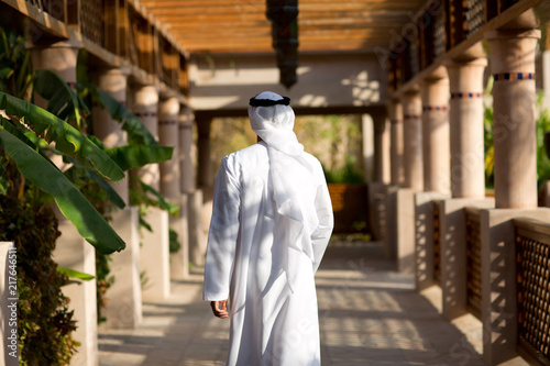 Emirati man walking outdoors. photo