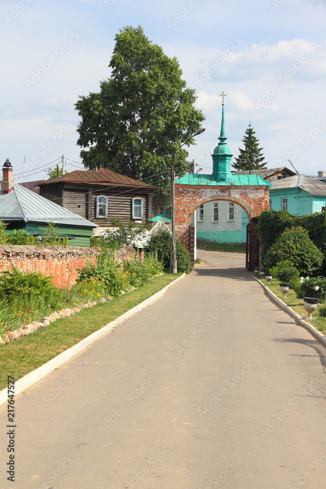 Russia, Mozhaisk Kremlin, region landmark - view from Novo-Nikolsky Cathedral to the main entrance on a summer day Russia, Mozhaisk Kremlin, region landmark - view from Novo-Nikolsky Cathedral to the main entrance on a summer day