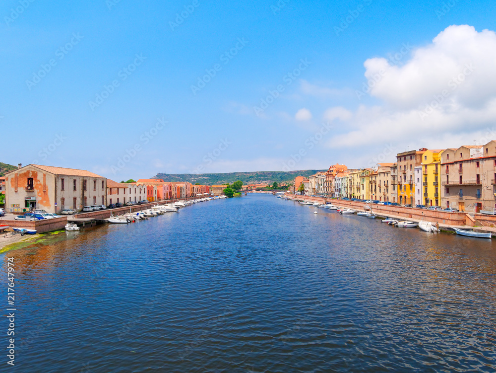 View of the river and river embankment in the city of Bosa. province of Oristano, Sardinia, Italy.