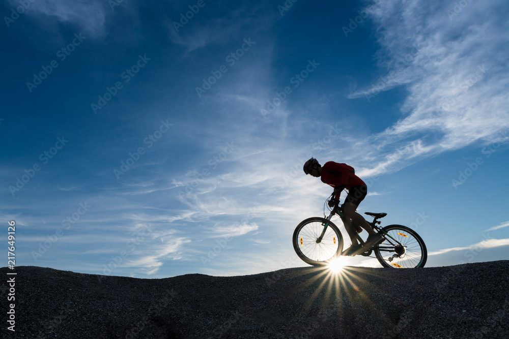 Young man riding mountain bike