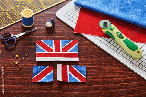 Parts of future pincushion viewing like union jack flag, sewing accessories photo