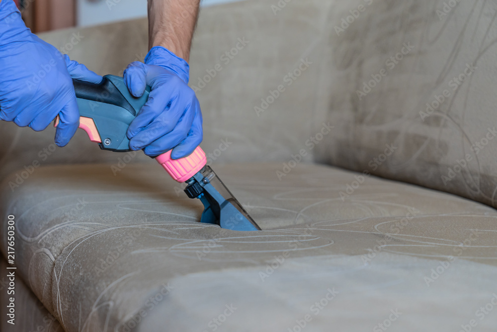 Closeup of upholstered Sofa chemical cleaning