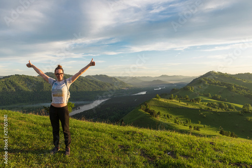 Travel, lesure and real life concept - woman in Altai mountain, beauty summer landcape