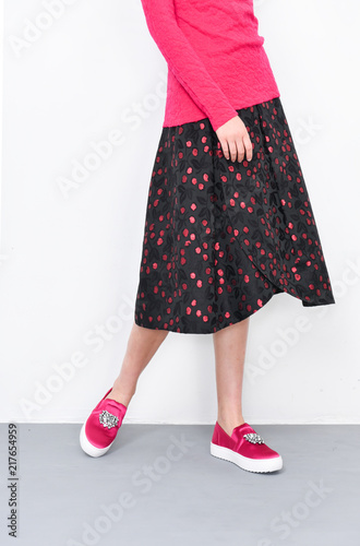 stylish woman in long skirt with shoes fashion concept