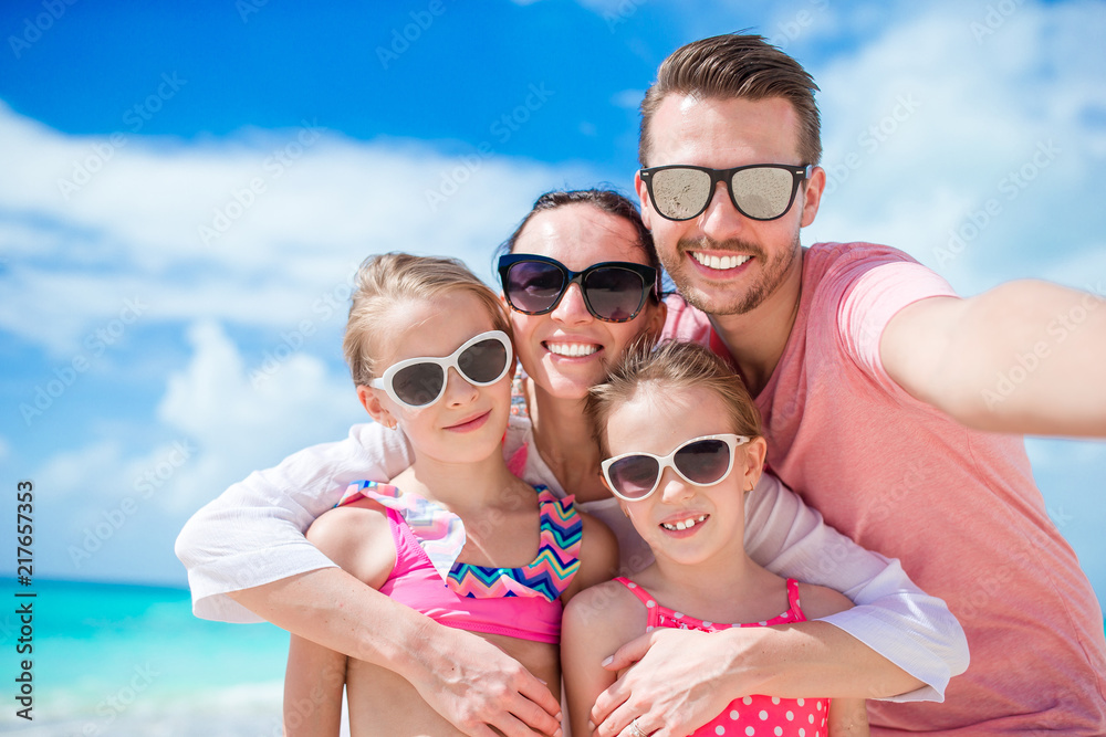 Fototapeta premium Happy family with kids walk on the beach