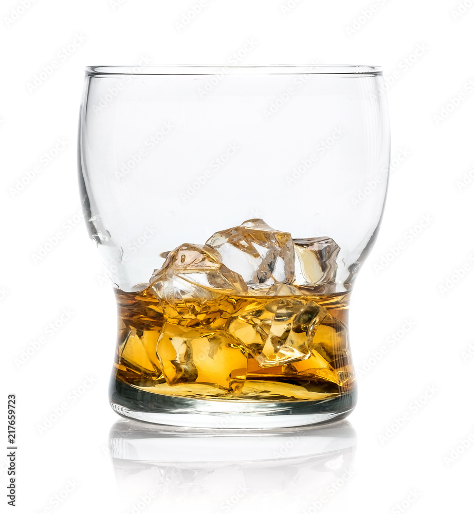 Isolated whiskey glass with the drink and cubes of ice Isolated whiskey glass with the drink and cubes of ice