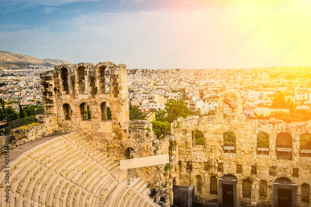 Herodes Atticus amphitheater with cityscape on the background in Acropolis, Athens, Greece