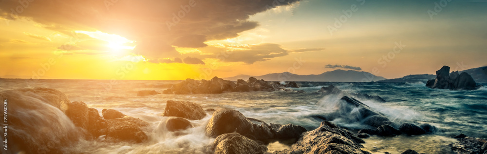 Beautiful seascape with rocks and waves at sunset Beautiful seascape with rocks and waves at sunset