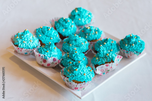 Cupcakes with turquoise cream